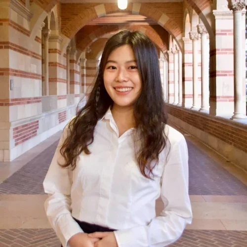 Alina Ryu standing in the hallways of Royce Hall at UCLA.
