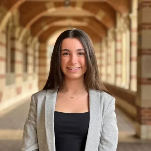 Talia Hovsepian standing in the hallways of Royce Hall at UCLA.