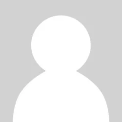 A simple, gray and white silhouette of a person representing a generic user or profile icon.